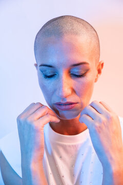 Middle aged fashion woman model with shaved head portrait