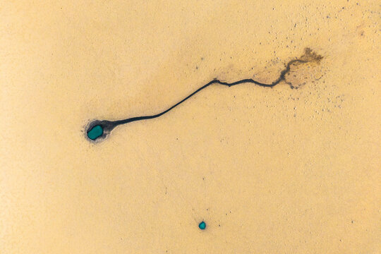 Aerial abstract saline wetland patterns in salar de Tara