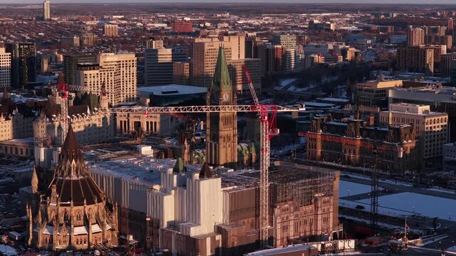 Spinning aerial view of parliament hill ottawa under construction