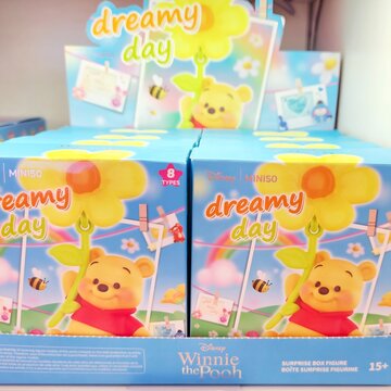 Varna. Bulgaria. 13.07.2026 Boxed collectible toy figures featuring the Disney character Winnie the Pooh are displayed on store shelves, part of a licensed blind box product line for children and coll