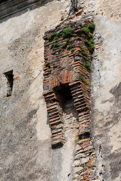 Medieval brick garderobe ruin on historic wall in Sighisoara, Transylvania, Romania.