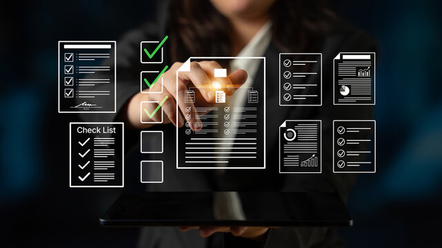Business Professional Using Digital Checklist to Organize Tasks and Track Progress with Touchscreen Technology in Modern Office Environment. Bitwise.
