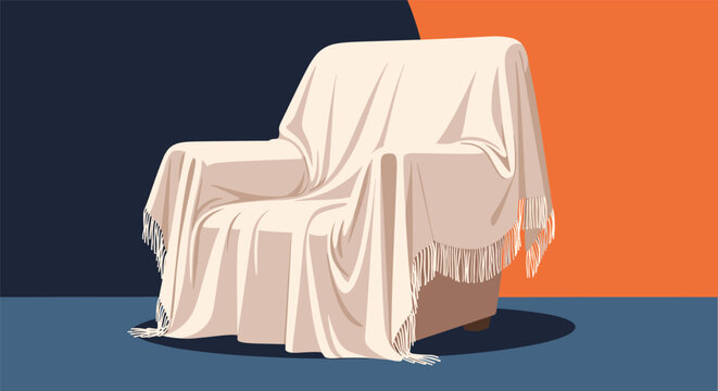 Comfortable armchair covered with a soft cream colored fringed blanket against a dark and orange abstract background.
