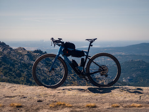 Gravel bike overlooking Sierra de Guadarrama in summer