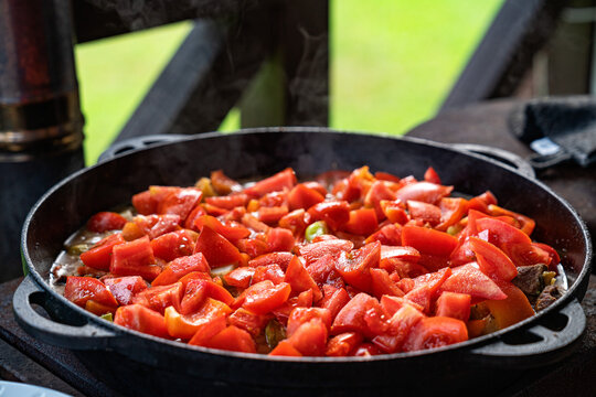 Fresh vegetable stew in cast iron pan outdoors
