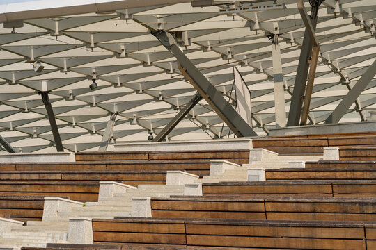 Modern stadium seating detail with steel roof structure