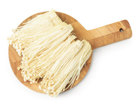 Clusters of raw enoki mushrooms isolated on white, top view