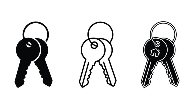 Three black and white house keys on a ring  isolated on white