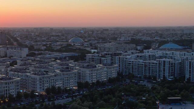 Tashkent, Uzbekistan - July 05, 2026: Tashkent City at Golden Hour, Modern Skyline Glowing in Warm Evening Light. Uzbekistan. 4K