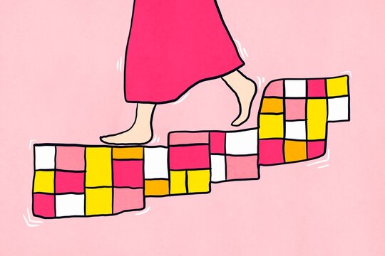 Woman stepping on colorful blocks as a path to progress