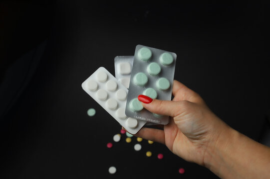 Women's health, treatment of women's diseases. Vaginal suppositories, pills blisters, tampon, awareness tape