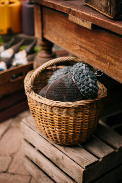 Rustic garden basket with pine cone and mesh ball decor