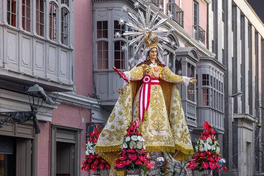 Virgin mary statue in street procession, historic Lima
