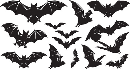 Fototapeta premium Set of black silhouettes of flying bats in different positions for halloween design