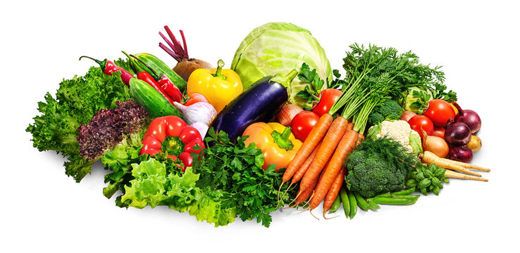 Fresh vegetables pile vibrantly against a clean white backdrop