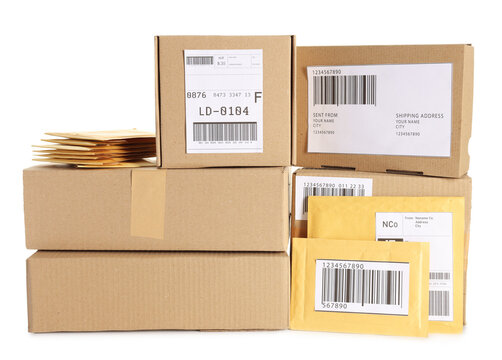 Postal envelopes and parcels isolated on white