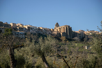 Fototapeta premium Arnes village and church from olive groves