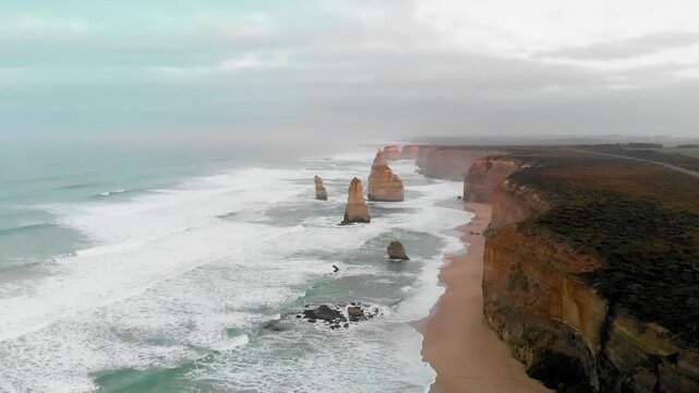 Aerial view of Twelve Apostles from drone, Australia. Collection of limestone stacks. Slow motion