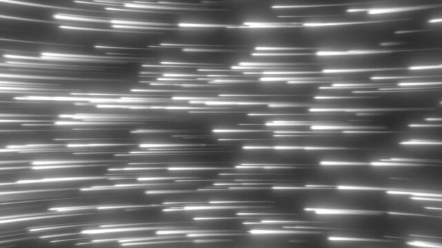 Vertical white light streaks falling across a dark monochrome background