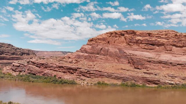 Colorado river and mountains from drone, panoramic aerial view in Moab area. Slow motion