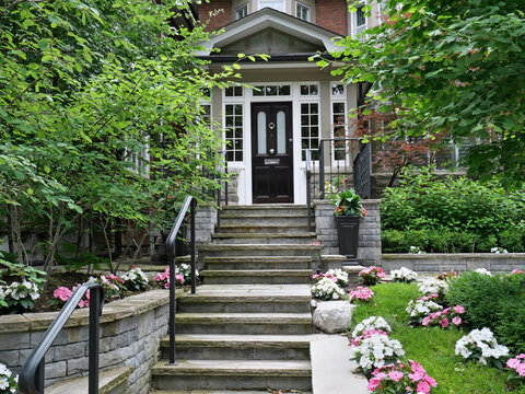 Flagstone steps leading to front door of house