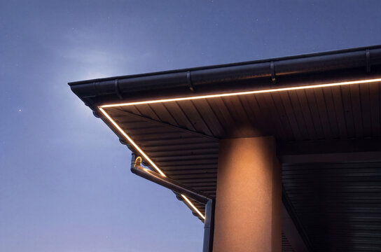 Illuminated roof gutter and soffit with warm led strip light