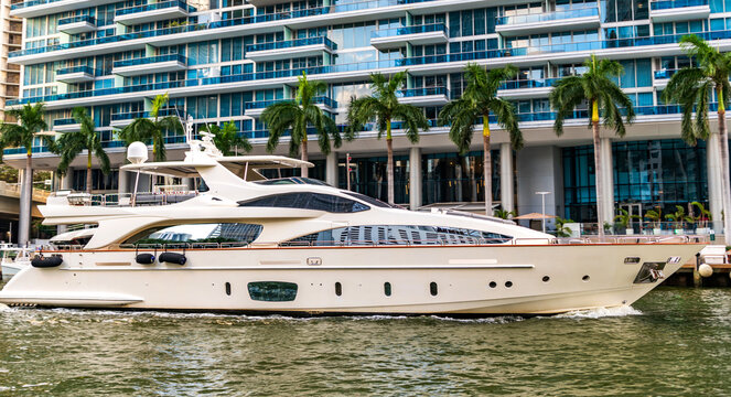 Luxury yacht at Biscayne bay. Boating and yachting charter. Luxury lifestyle. Vacation on summer. Yacht at sea. Sea vacation on summer. Luxury boat motor yacht in sea marina. Private yacht