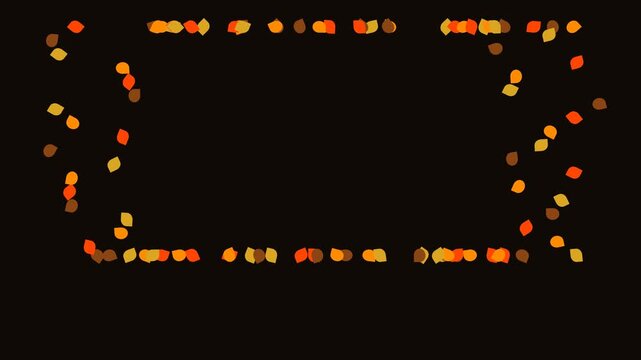 Autumn leaves forming rectangular frame on black background