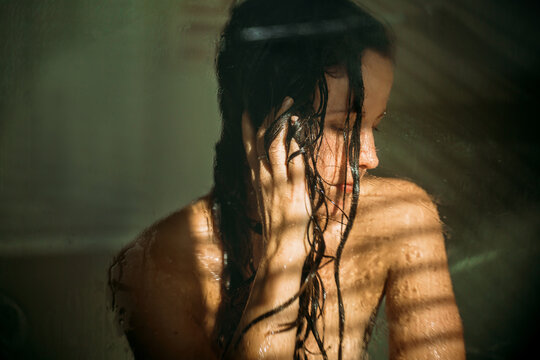 closeup of a woman in a shower