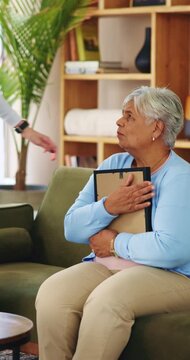 Picture frame, caregiver and comfort old woman with grief for memory, loss and empathy in homecare. Photo, carer and sad senior widower in assisted living for mourning, nostalgia or emotional support