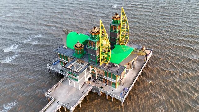 The Ziyadatul Abrar Floating Mosque, located at Siring Pagatan Beach in South Kalimantan