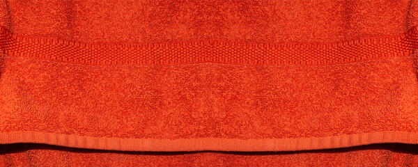 Red Terry Towel Fabric Texture Background with Soft Looped Cotton Surface © ZackZephyr