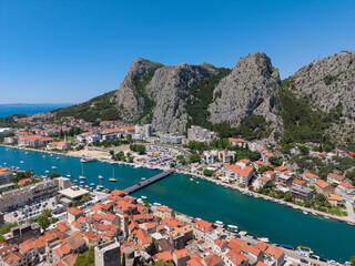 Aerial drone view of Omiš, Cetina River and Adriatic Sea, Croatia © Marcio
