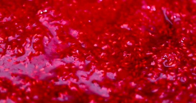 Fresh Red Grated raspberries with sugar, sweet grated raspberries represent a berry texture from a ripe harvest