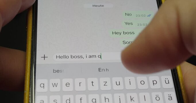 Close-up of a person typing a text message on a smartphone to resign from their job, illustrating career changes, resignation, mobile communication, and workplace decisions.