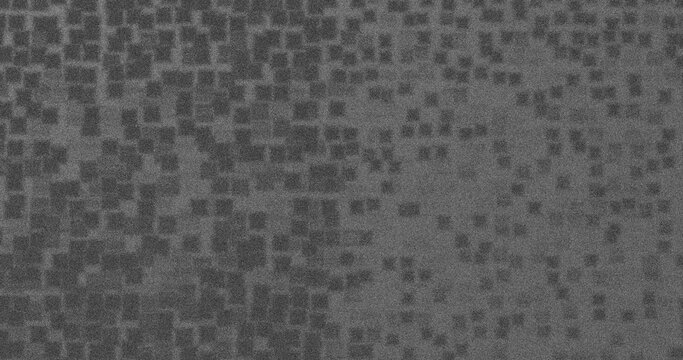 Monochrome minimalist abstract background featuring pixelated/scattered cube patterns transitioning with dense black noise and digital grain aesthetics