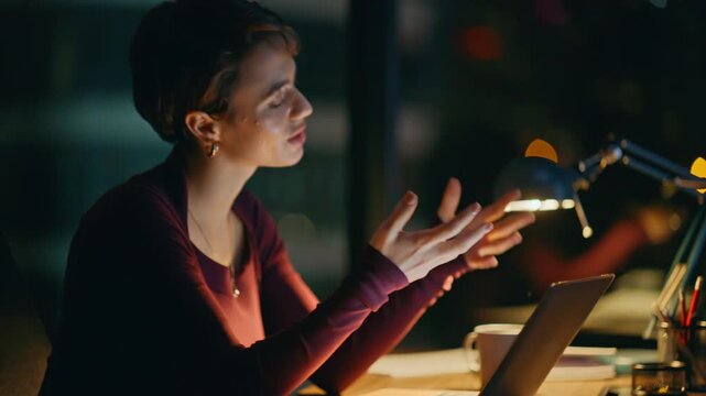 Businesswoman thinking laptop night office. Pensive lady working late evening