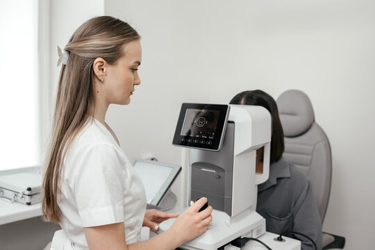 Modern autorefractor used for comprehensive eye examination and refractive error assessment during a professional vision test in an ophthalmology clinic