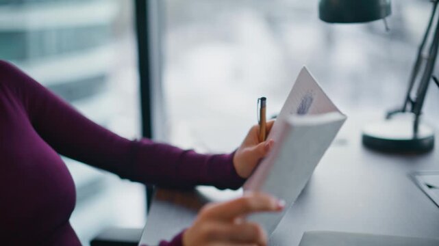 Businesswoman sketching notebook office. Closeup pensive manager drawing flower