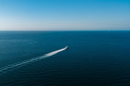 Single Boat Enjoys A Lonely Horizon