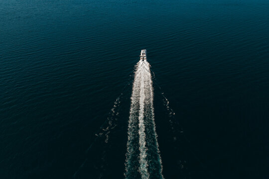 A Solitary Boat Leaving It's Mark