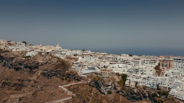 Aerial cliffside view of Fira/Thira, Santorini, Greece with switchback path