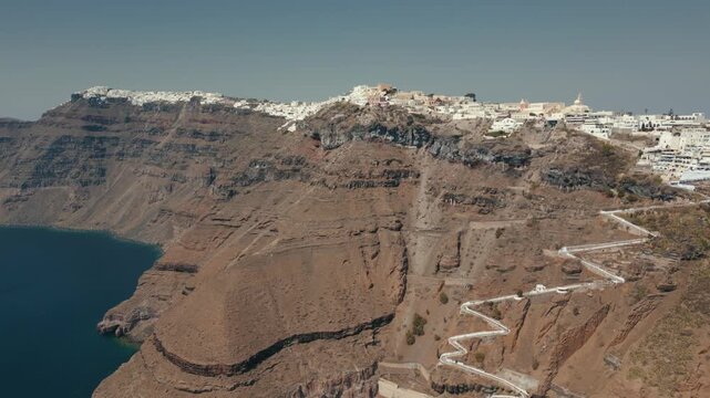 Aerial cliffside view of Fira/Thira, Santorini, Greece with switchback path