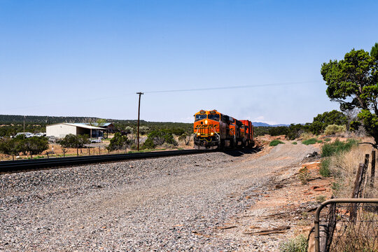 Chilton Ranch crossing 7-12-2026 Mountainair NM USAEast Bound BNSF stack train climbing towards Mountainair New Mexico at the Chilton Ranch crossing on the BNSF Clovis Sub