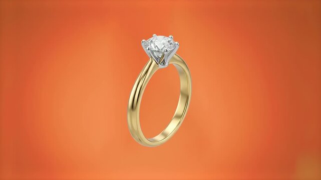 A luxurious gold engagement ring with a brilliant-cut diamond solitaire rotates in a seamless 3D loop. This jewelry asset is isolated on a solid orange background.