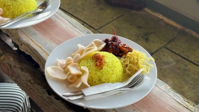 Yellow rice with habang spices at a beachside restaurant