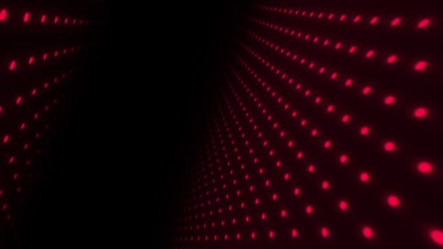 Glowing red dots grid in perspective on black background. Seamless looping abstract light corridor animation.