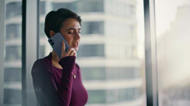 Business lady talking phone office window. Close up upset woman bad news call.