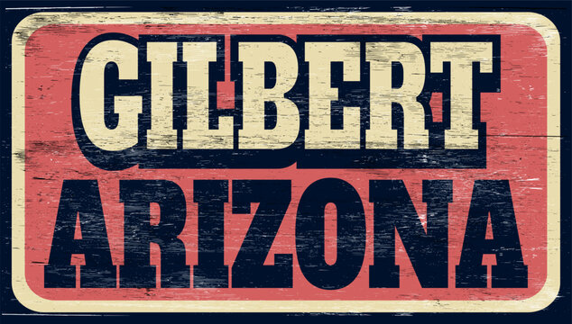 Aged retro Gilbert Arizona sign on wood
