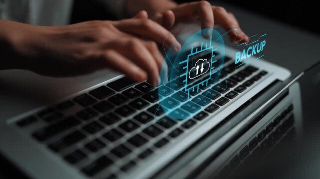 Hands Typing on Laptop with Digital Cloud Backup Concept Displayed, Emphasizing Data Security and Technology Advancement in Modern Workspace. Entropy.